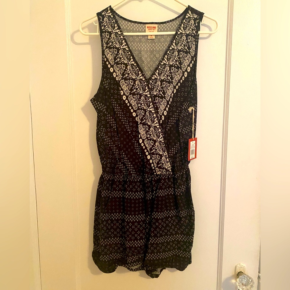 Black and white romper with tags on, never worn